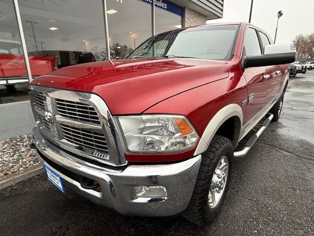 2010 Dodge Ram 2500 Laramie in Inferno Red Crystal Pearl — front three-quarter view