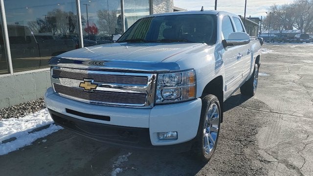 2011 Chevrolet Silverado 1500 LTZ in Summit White — front three-quarter view