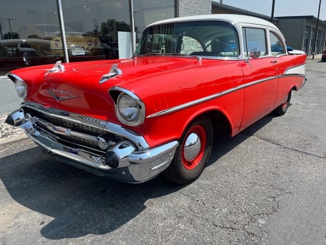 1957 CHEVY 210 Base in Red — front three-quarter view